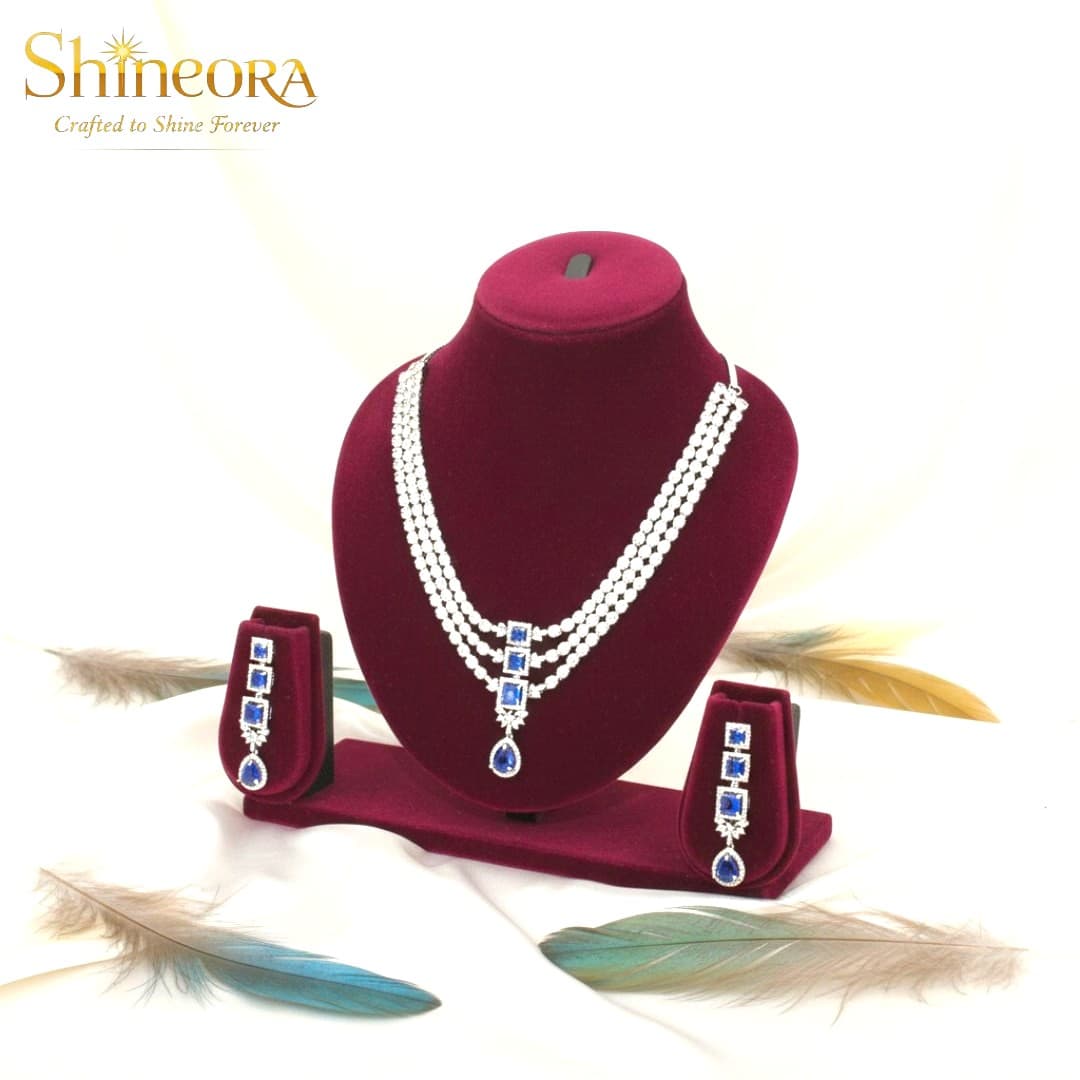 Azure Royalty: Three-Tier Diamond & Blue Sapphire Statement Set